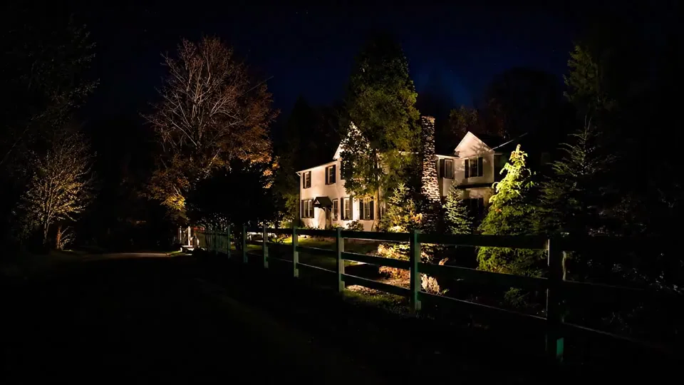 Home and landscape lit with low-voltage lighting at night